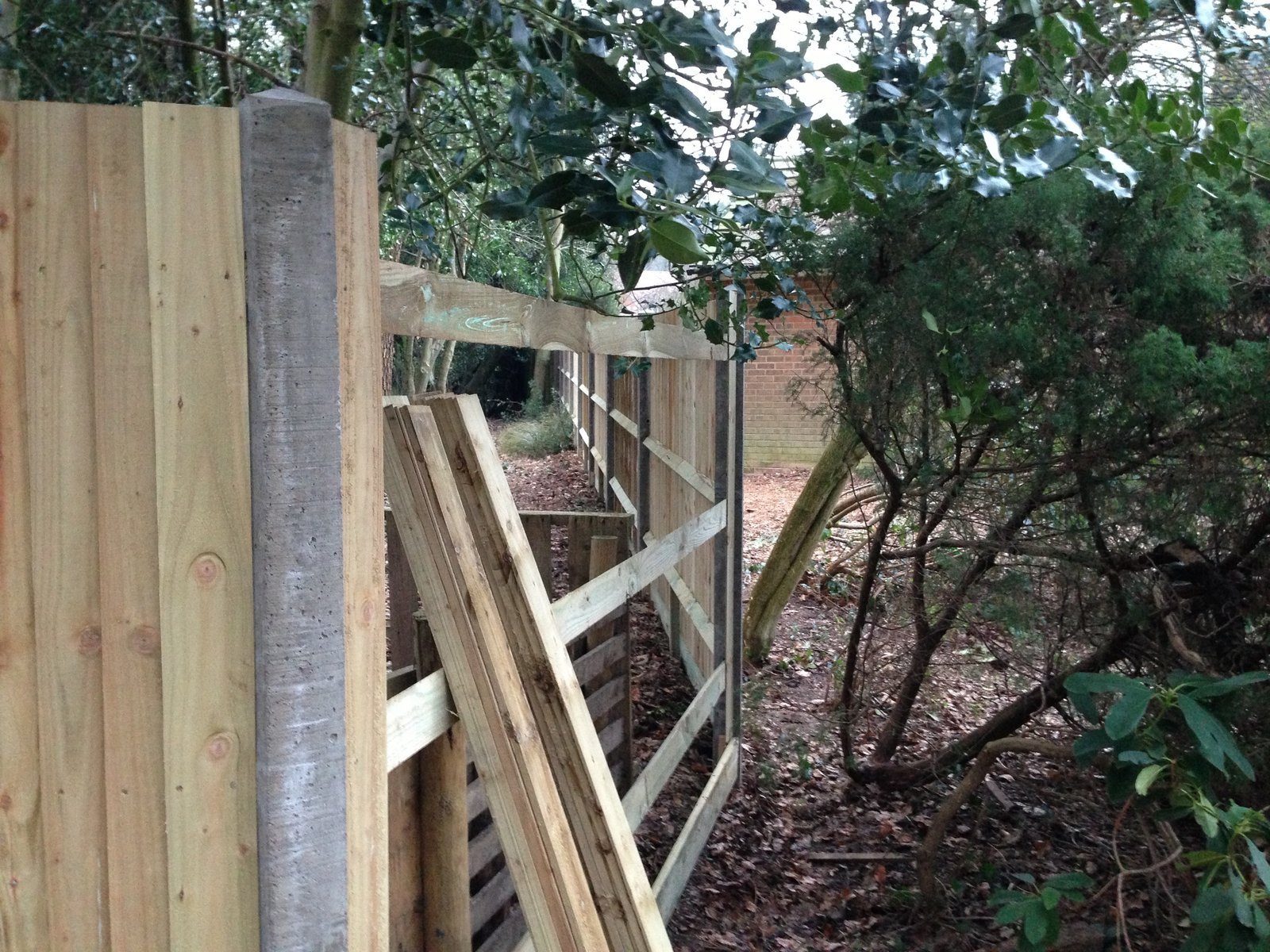 Before 1 — Woodland Closeboard fence install with wooden posts in Hungerford